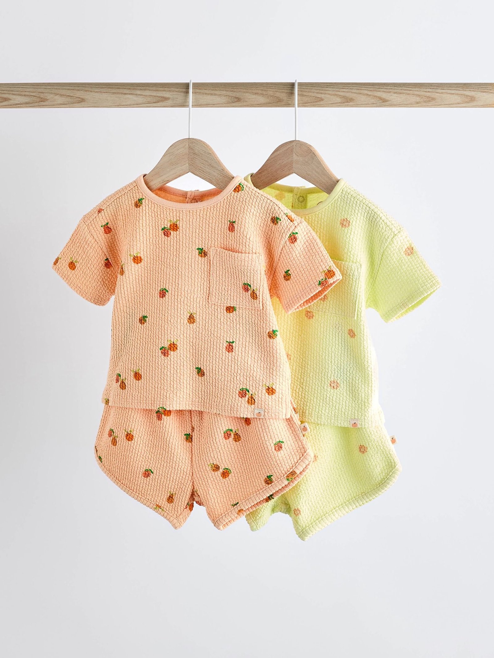 540088s Next - Fluro Green/ Orange Floral 2 Pack Baby T-Shirts and Shorts Set - Image 1